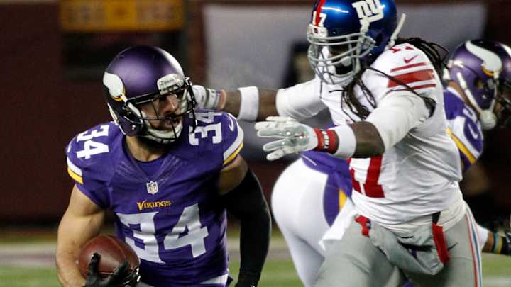 Vikings rout Giants 49-17 to clinch playoff spot