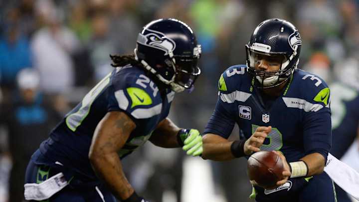 Watch: Marshawn Lynch shoves cameraman out of huddle