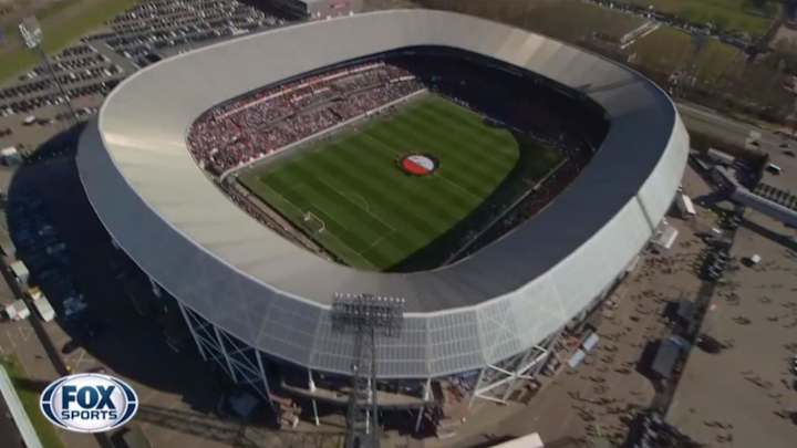 Cameraman parachutes into stadium for Dutch soccer game Cameraman parachutes into stadium for Dutch soccer game