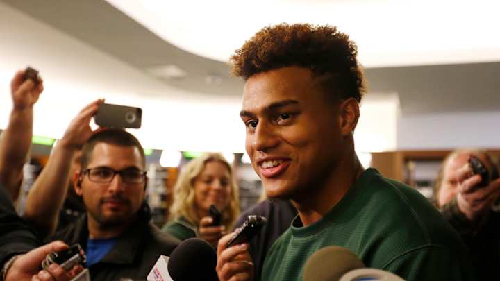 Jets' McDougle returns to field after missing last season