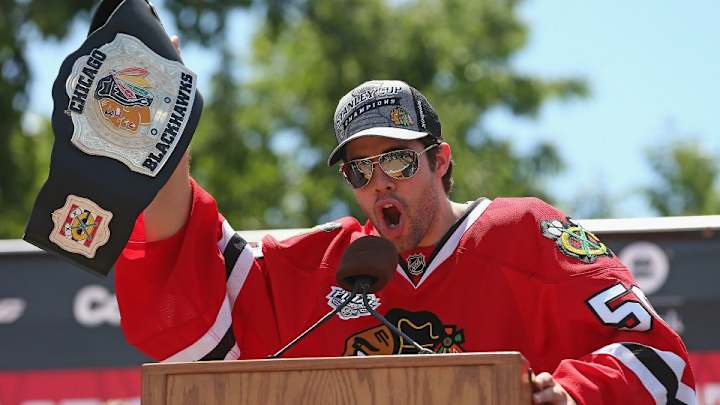Corey Crawford tries not to swear at Blackhawks rally this year...fails