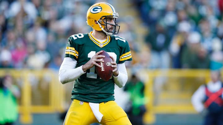 Packers QB Aaron Rodgers limited in practice with right shoulder injury