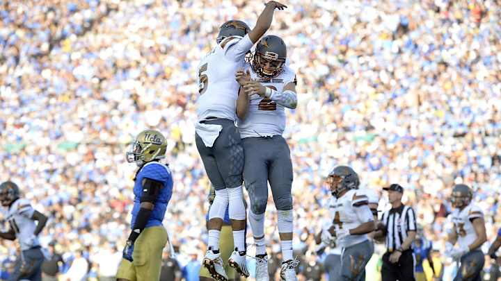 Watch: ASU’s Kalen Ballage carries tacklers 23 yards to seal win