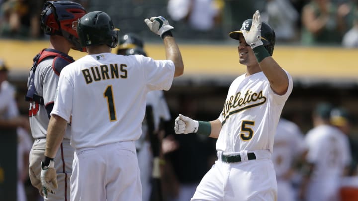 Josh Reddick hits grand slam, Athletics slug past Twins 14-1