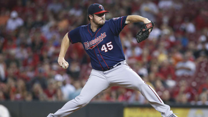 Hunter homers, Twins beat Reds 8-5 after long weather delay