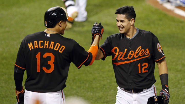 Orioles use 2 grand slams to rally past Royals 14-8