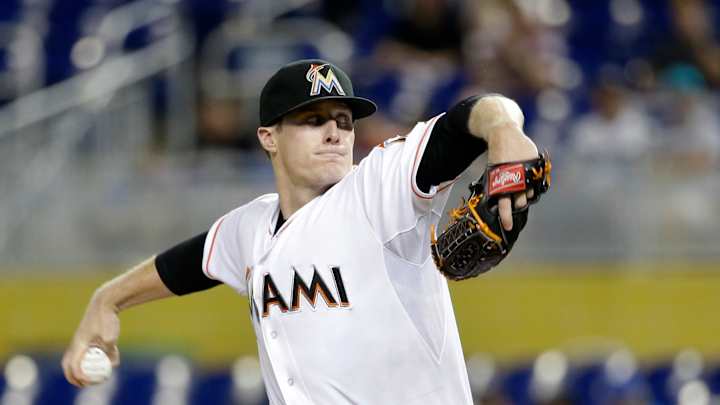 Happ pitches 6 innings to help Pirates beat Marlins 5-2