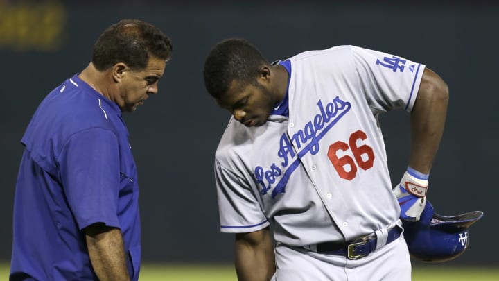 Puig's hamstring injury not considered serious, day to day