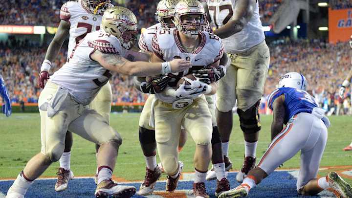 No. 14 FSU beats No. 10 Florida 27-2, 3rd straight in Swamp