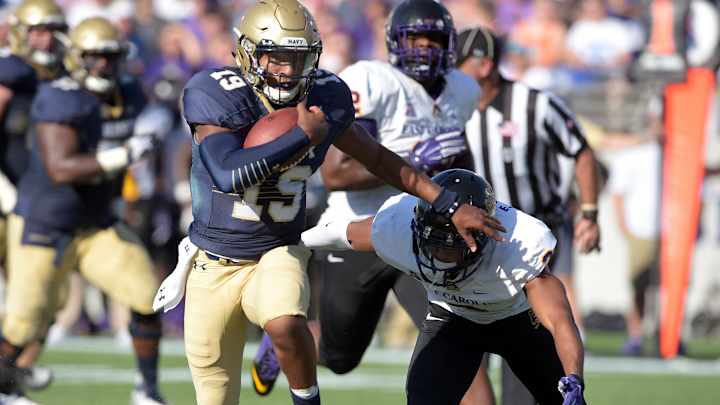 Navy runs through East Carolina 45-21