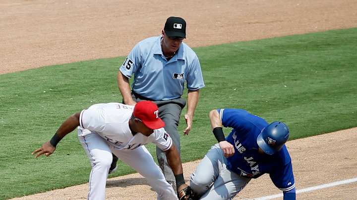 Gallardo wins 100th, Rangers end Toronto's 5-game win streak