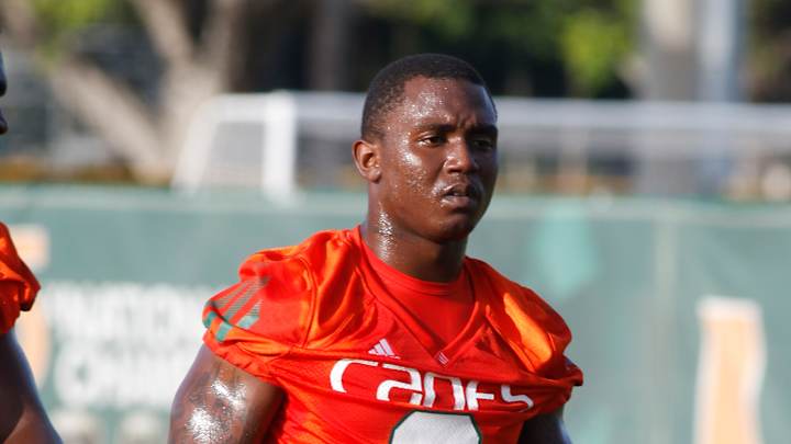 Miami RB Joe Yearby determined to be a player and a dad