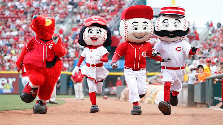 Cubs' Anthony Rizzo almost run over by stampeding Reds mascots Cubs' Anthony Rizzo almost run over by stampeding Reds mascots