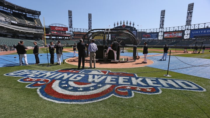 Chicago White Sox drive cars onto field at home opener