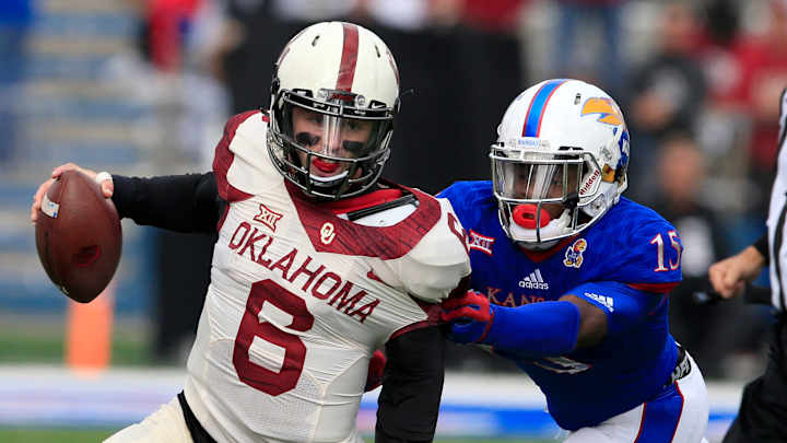 Mayfield throws for 383, No. 14 Oklahoma blows out Kansas Mayfield throws for 383, No. 14 Oklahoma blows out Kansas