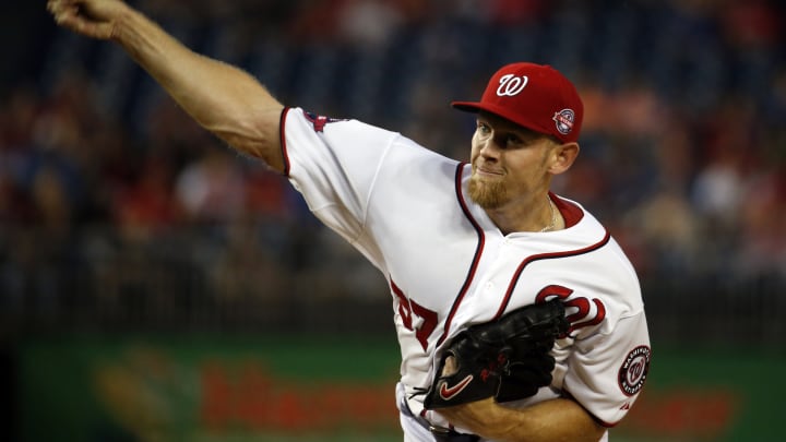 Latos, Marlins limit Nationals to 3 hits in 2-1 victory