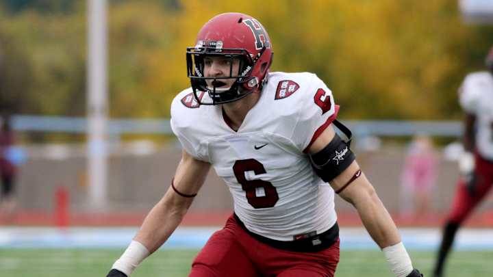 Penn ends Harvard's 22-game streak, wins 35-25