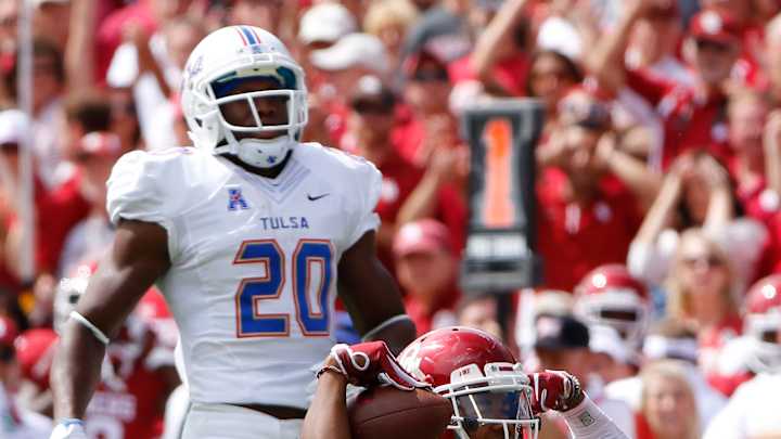 Mayfield sets record; No. 16 Oklahoma beats Tulsa 52-38