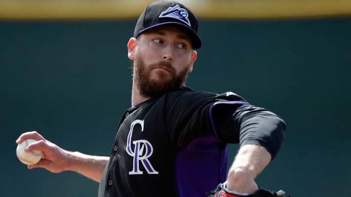 Rockies add relief pitcher John Axford to 40-man roster