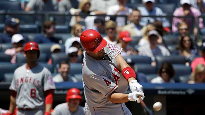 Pujols ties Mantle on HR list