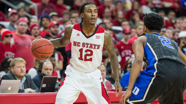 Fan shoves N.C. State's Cat Barber during game at Miami