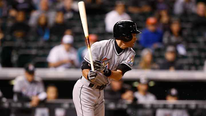 Stanton's long HR helps Marlins beat Rockies 6-2 in rain
