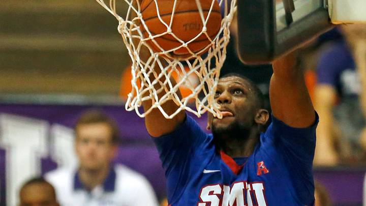 Moore scores 26 points, leads No. 22 SMU over TCU 75-70 Moore scores 26 points, leads No. 22 SMU over TCU 75-70
