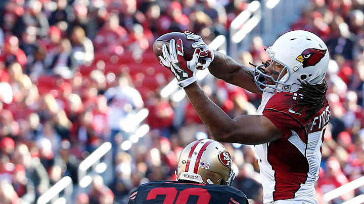 Palmer's 8-yard TD run leads first-place Cards past 49ers