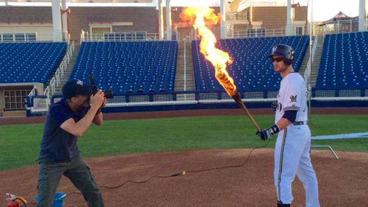 Brewers' Jonathan Lucroy uses bat on fire in promo pictures