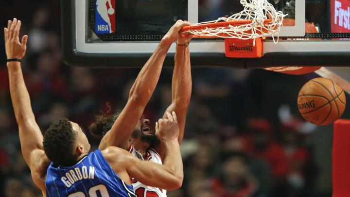 Bulls withstand late surge to beat Magic 92-87
