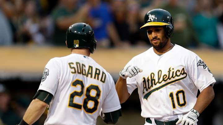 Brooks earns first career win in A's debut, 5-1 over Indians