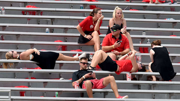 College football's opening weekend dogged by weather delays