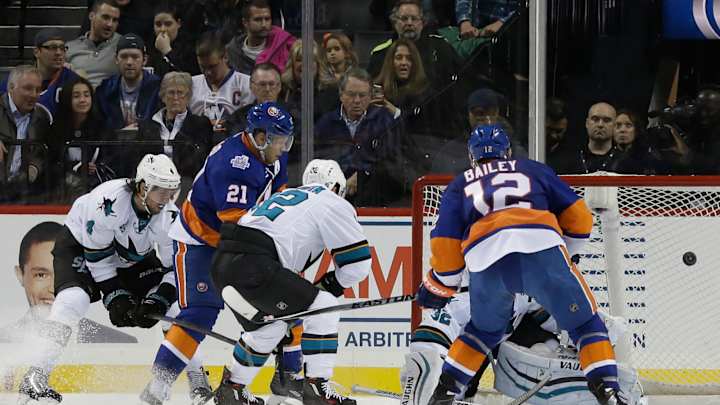 Okposo helps Islanders hand Sharks their 1st loss, 6-3 Okposo helps Islanders hand Sharks their 1st loss, 6-3