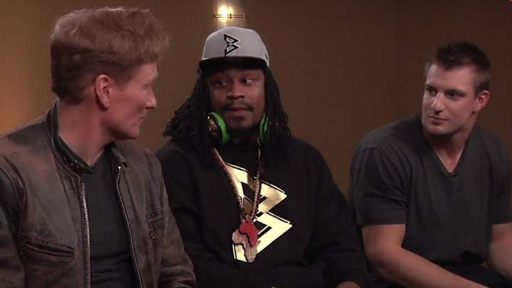 Marshawn Lynch, Rob Gronkowski teach Conan how to crotch grab