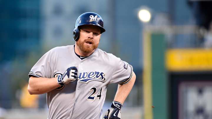 Brewers exercise option on 1st baseman Adam Lind