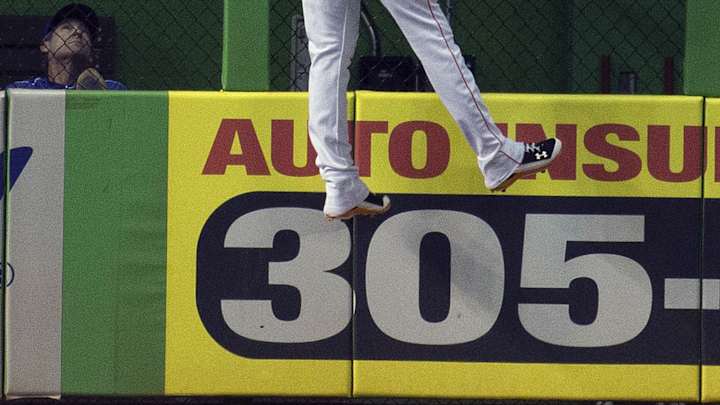 Giancarlo Stanton hurts hand as Marlins lose to Dodgers 7-1