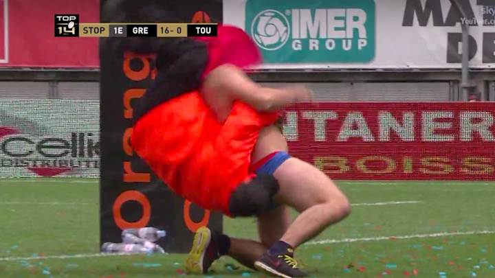 Watch: Rugby streaker in Superman costume suplexed by security guard