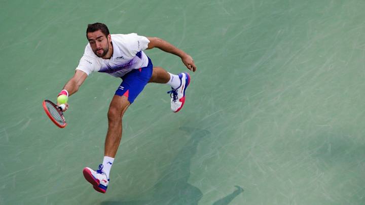 The Latest on US Open: Cilic overcomes tweaked ankle to win