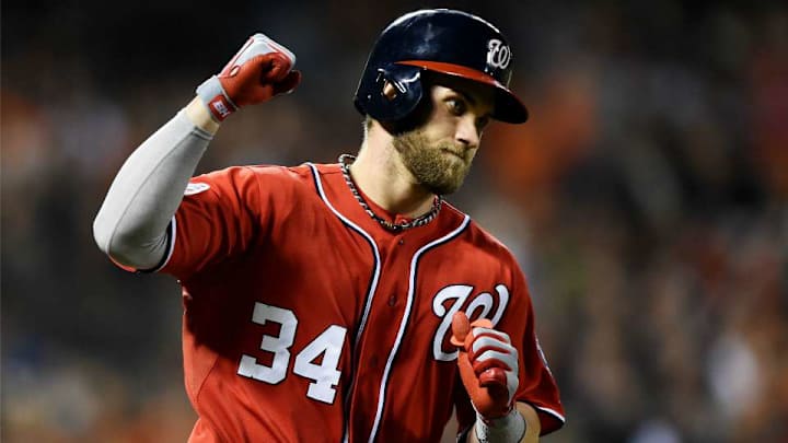 Bryce Harper surprises young fan with PS4 during All-Star Parade