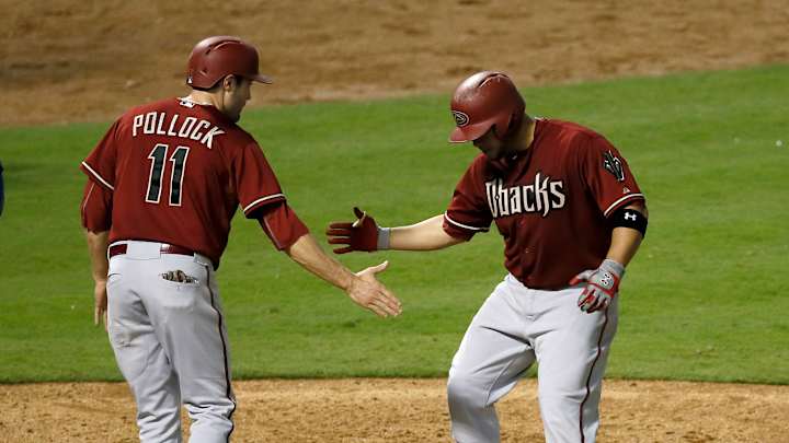 Pollock, Diamondbacks top Rangers 7-4 in Harrison's return