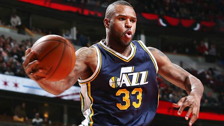 Video: Jazz's Trevor Booker beats clock with crazy circus shot