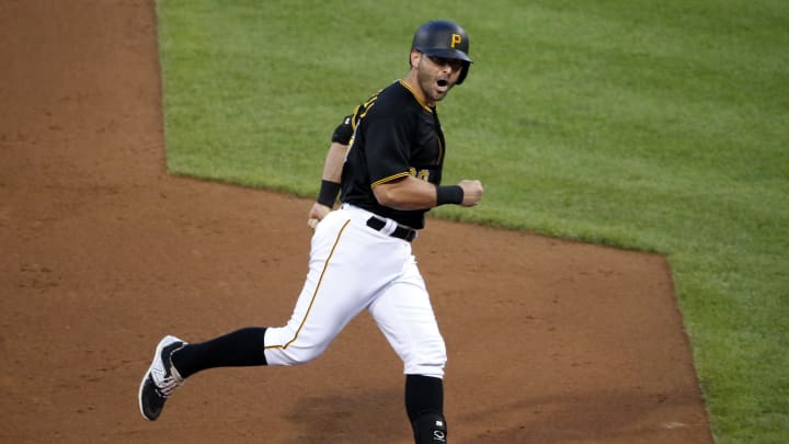 Pirates ride big inning to 7-6 win over Reds