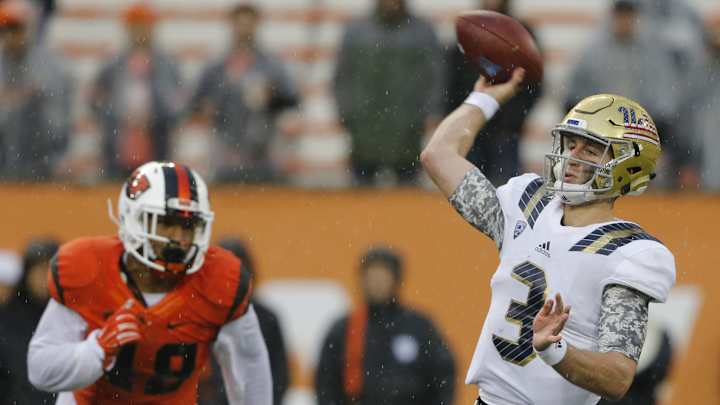 No. 18 UCLA's offensive line tunes out noise and gets better