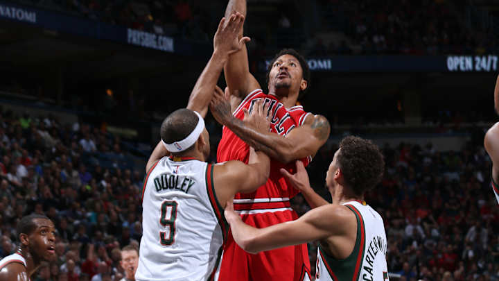 Rose scores 34, Bulls hold off Bucks 113-106 in double OT
