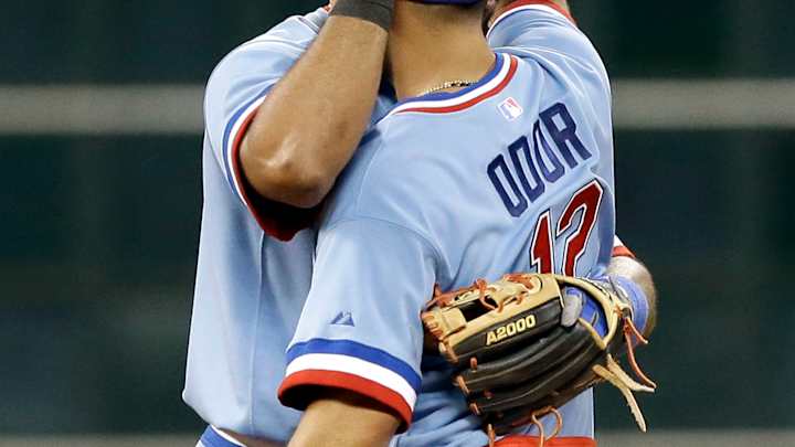 Odor homers, gets into testy exchange as Rangers beat Astros