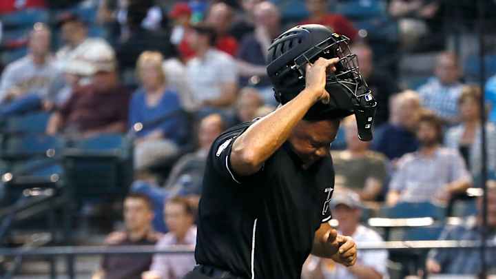 Plate umpire Danley leaves game after foul off his facemask