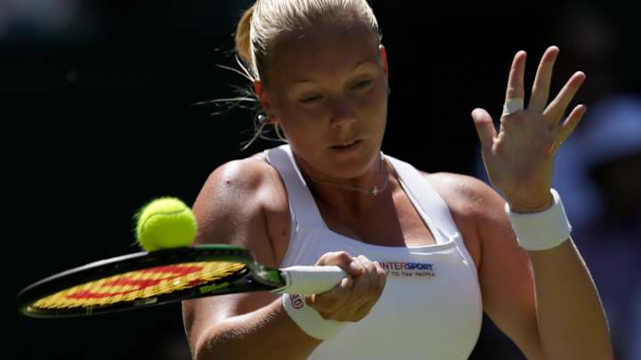 Kvitova opens Wimbledon defense with 6-1, 6-0 win