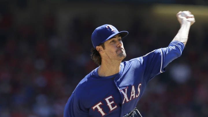 Rangers win AL West on final day, Hamels beat Angels 9-2