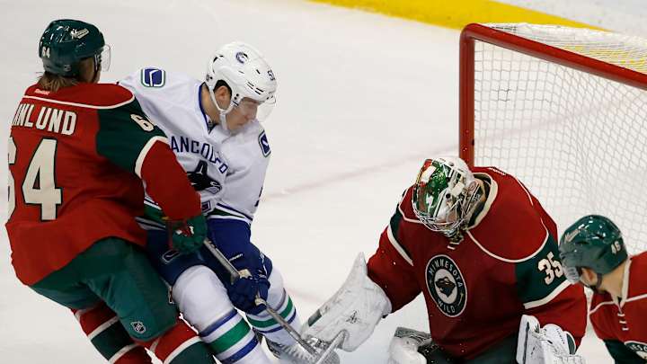 Wild clobber Canucks 6-2, with 4-point games by Vanek, Koivu Wild clobber Canucks 6-2, with 4-point games by Vanek, Koivu