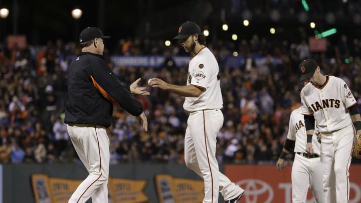 Dodgers clinch third straight NL West title, beat Giants 8-0